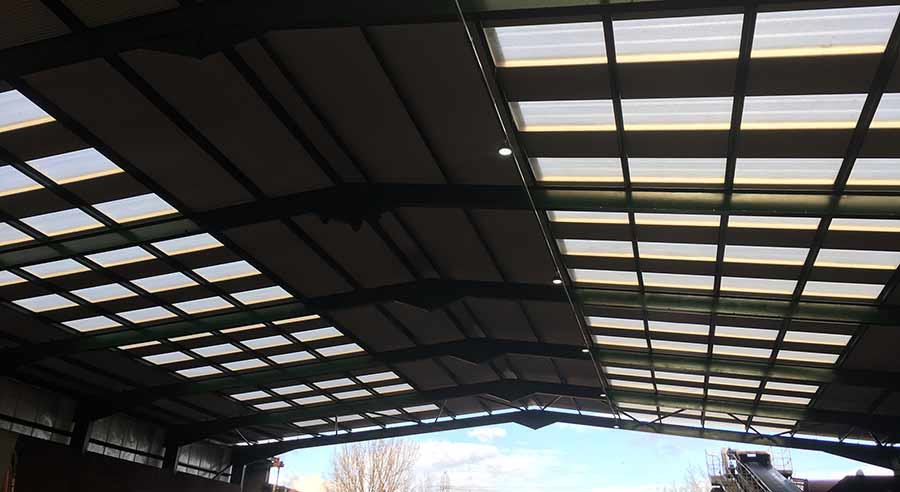Recycling centre with polycarbonate DLTR roof. Lights around 50% roof light area.